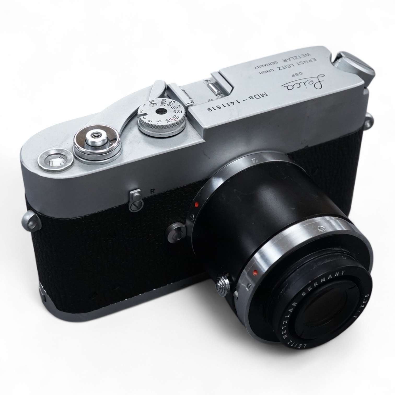 A Leica M Series MDa camera, with a Leitz 0.32:1 lens, the body stamped ‘1411519’
